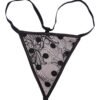 Black lace thong featuring polka dot corset bustier design and delicate floral patterns