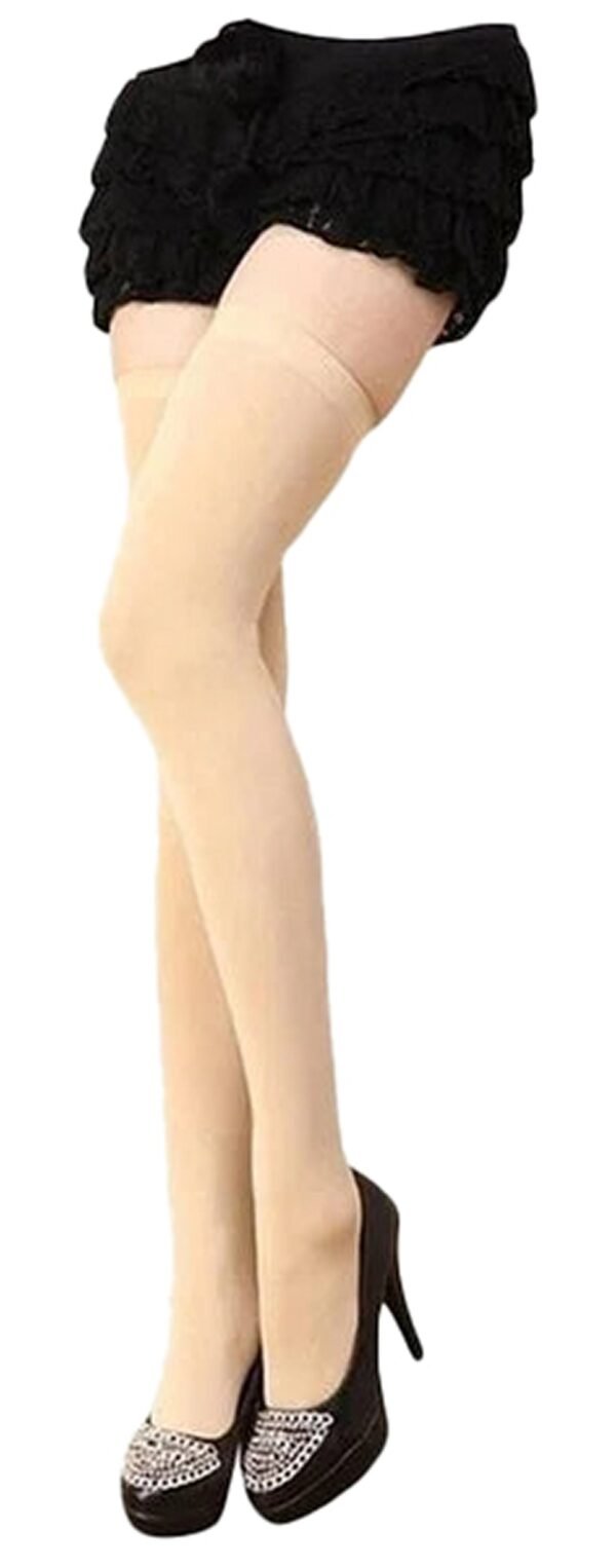 Over the knee black socks for women styled with a chic black skirt and high heels