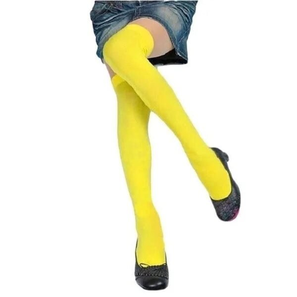 Bright yellow thigh-high socks, perfect for stylish outfits, showcasing over the knee black socks for women.