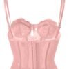 Plus size gothic corset top in pale pink featuring adjustable straps and lace detailing