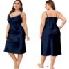 Plus size satin nightgown for women in navy blue with adjustable spaghetti straps and a flowing silhouette