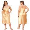 Plus size satin nightgown for women in a soft golden hue with adjustable straps and elegant flow