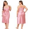 Plus size satin nightgown for women in soft pink with adjustable straps and a sleek fit