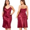Plus size satin nightgown for women in burgundy with a cowl neckline and adjustable straps, showcasing a sleek design.