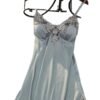 Elegant satin suspender nightdress for women in light blue with lace detailing and adjustable straps