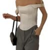 Elegant square neck corset crop top in white, paired with stylish gray trousers for a chic look