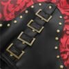 Close-up of a steampunk corset top for women featuring black leather and decorative studs