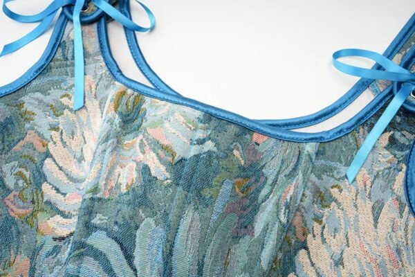 Luxurious floral print Victorian corset top for women with blue ribbon ties and elegant design