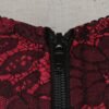Close-up of a red floral lace zippered plus size vintage corset vest for women showcasing intricate design