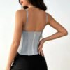 Back view of a gray women's corset bustier top with adjustable straps and zipper closure