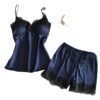 Women's satin pajama set in navy with lace trim featuring a camisole and shorts for comfortable sleepwear